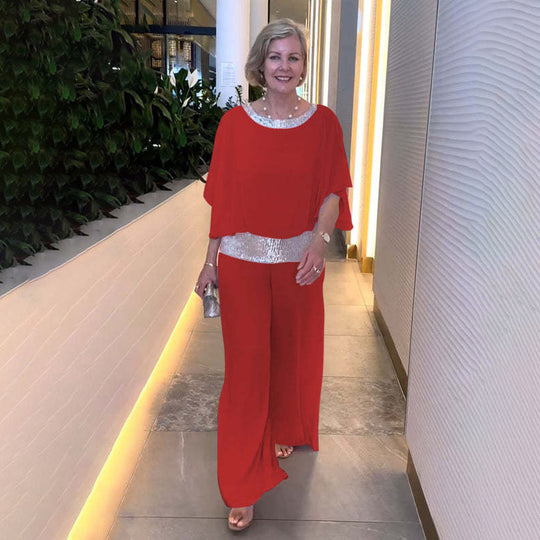 Damen Eleganter Jumpsuit mit schimmerndem Oberteil und weitem Bein Heidi-Mode