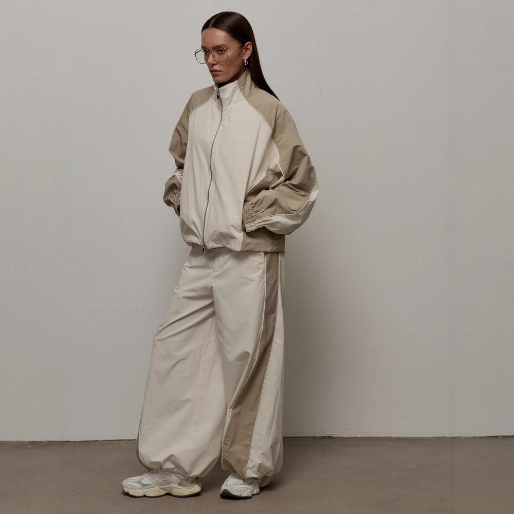 Damen sportliche Kapuzenjacke mit hohem Kragen und asymmetrischem Design Heidi-Mode