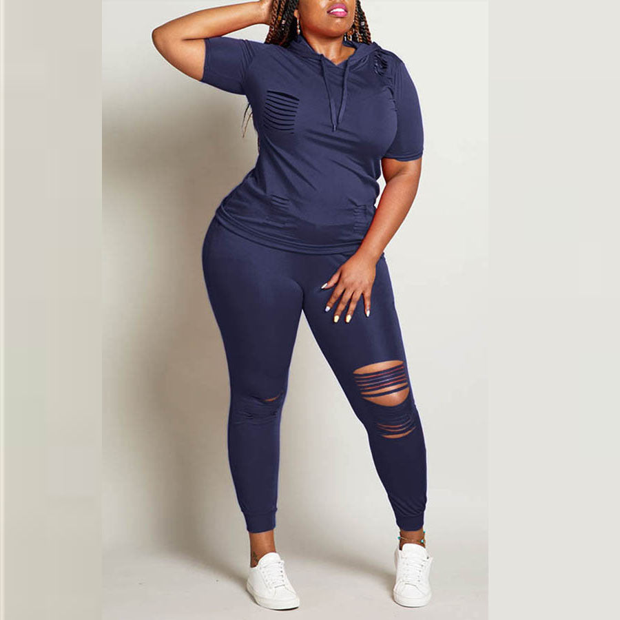 Damen Jogginganzug mit stylischen Zipper-Details und sportlicher Passform Heidi-Mode