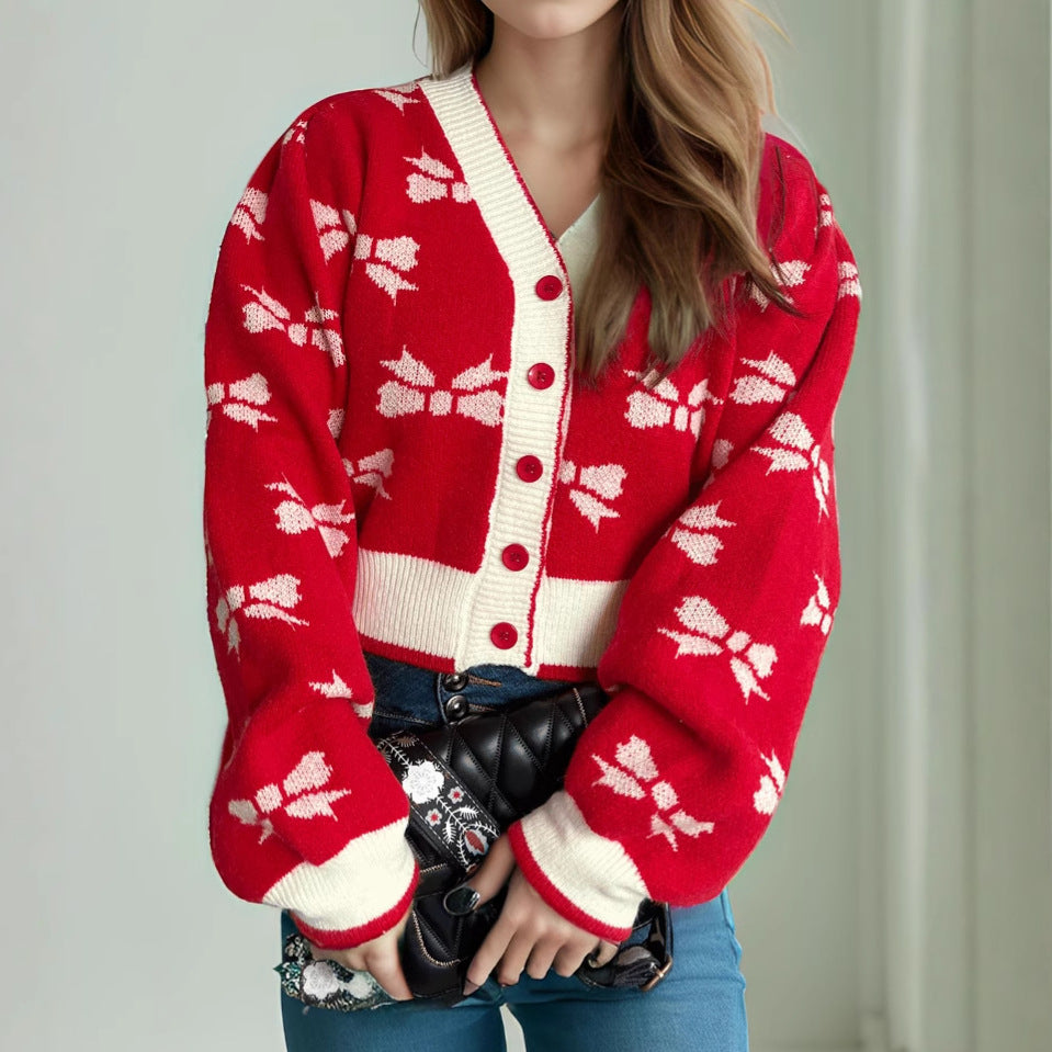 Damen Strickjacke mit verspieltem Schmetterlingsmotiv und dekorativen Knöpfen Heidi-Mode