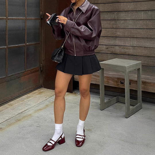 Damen modische Kunstlederjacke im lässigen Schnitt mit elastischem Bund Heidi-Mode