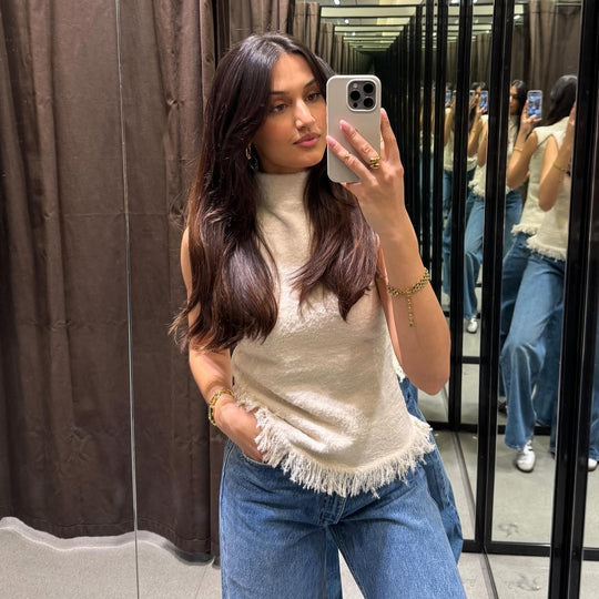 Damen ärmelloses Strickoberteil mit elegantem Stehkragen und fransigem Saum Heidi-Mode