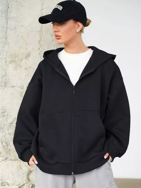 Damen oversized Kapuzenjacke mit durchgehendem Reißverschluss und großen Taschen Heidi-Mode