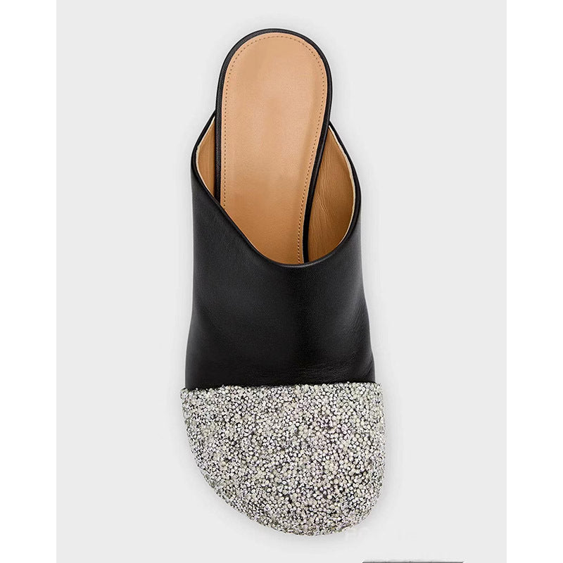 Femme Open-Toe Mules mit skulpturalem metallischem Absatz Heidi-Mode