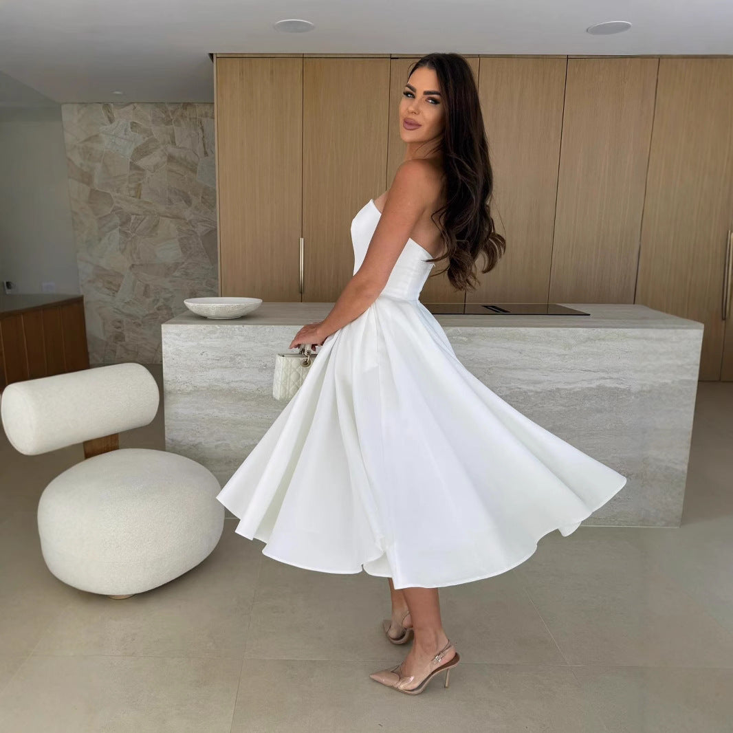 Damen A-linien Cocktailkleid mit trägerlosem Schnitt und schwingendem Rock Heidi-Mode