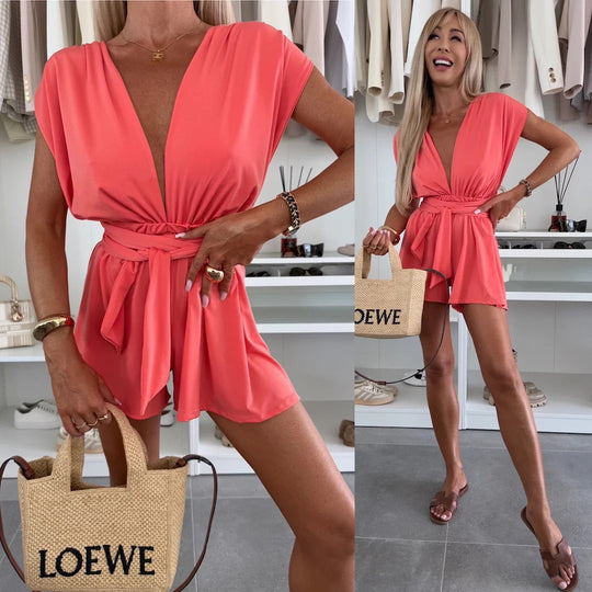 Damen Eleganter Jumpsuit mit tiefem V-Ausschnitt und Taillengürtel Heidi-Mode