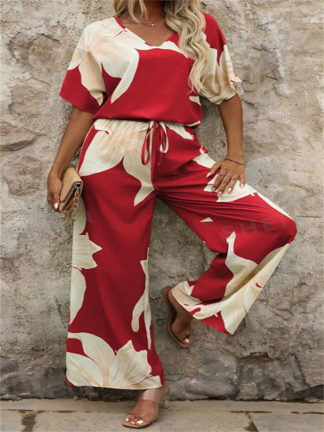 Damen Eleganter Jumpsuit mit floralen Mustern und weitem Bein Heidi-Mode