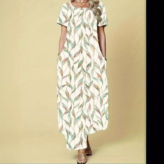 Damen Maxikleid mit elegantem Blattmuster und praktischen Taschen Heidi-Mode