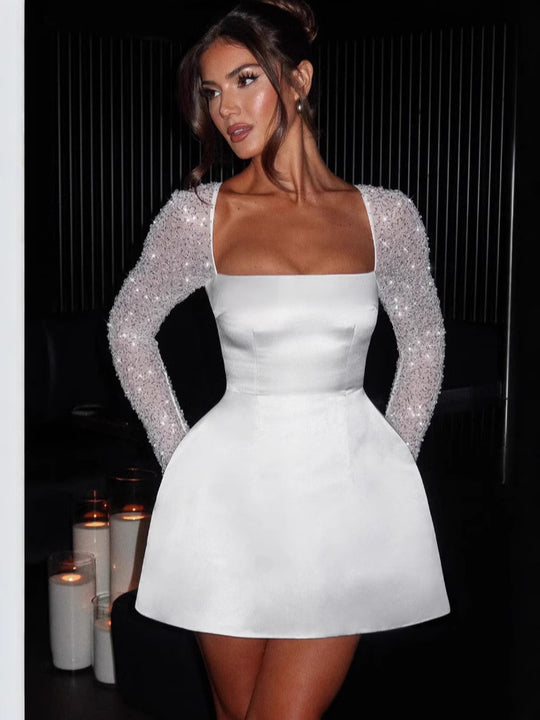 Damen Glamouröses Minikleid mit transparenten Paillettenärmeln und schwingendem Rock Heidi-Mode