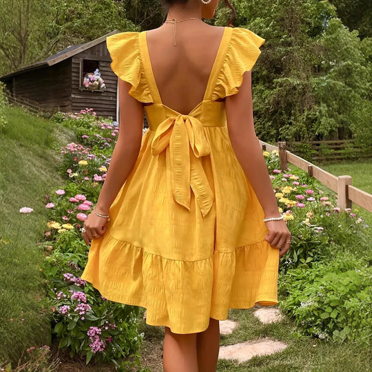 Damen luftiges Baumwollkleid mit Rüschendetails und offenen Rücken Heidi-Mode