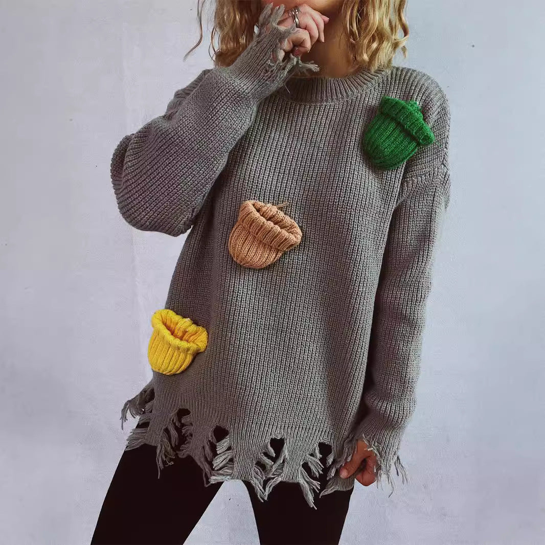 Damen lässiger Oversize-Pullover mit fransigen Details und bunten Applikationen Heidi-Mode