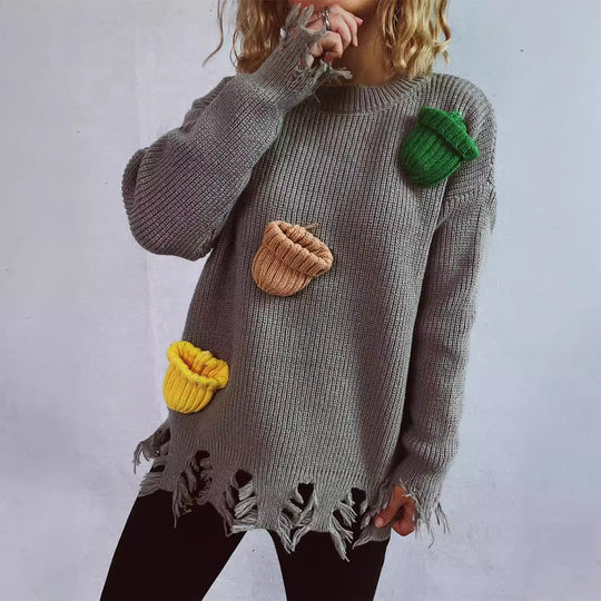 Damen lässiger Oversize-Pullover mit fransigen Details und bunten Applikationen Heidi-Mode