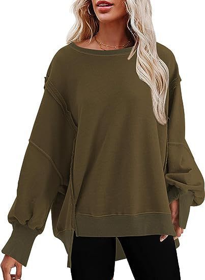 Damen Oversize Sweatshirt mit Ballonärmeln und seitlichen Schlitzen Heidi-Mode