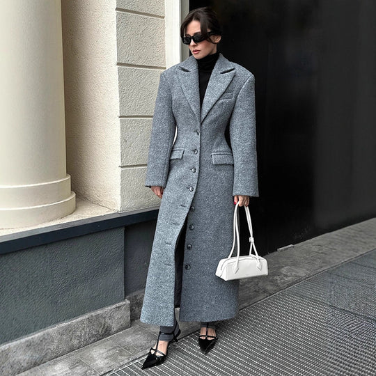 Damen eleganter Wollmantel mit strukturiertem Design und praktischen Taschen Heidi-Mode