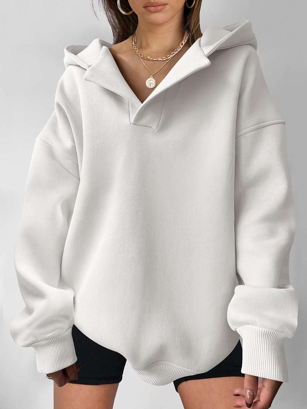 Damen Oversized Hoodie mit kurzem Kragen und praktischen Seitentaschen Heidi-Mode