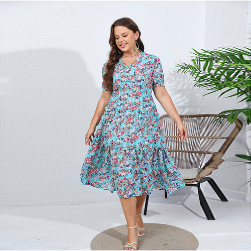 Damen Midikleid mit verspieltem Blütenmuster und voluminösem Rock Heidi-Mode