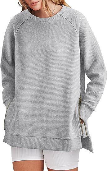 Damen lässiger Sweatshirt mit Seitentaschen und Reißverschluss Heidi-Mode