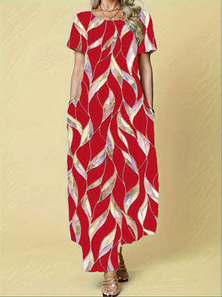 Damen Maxikleid mit elegantem Blattmuster und praktischen Taschen Heidi-Mode