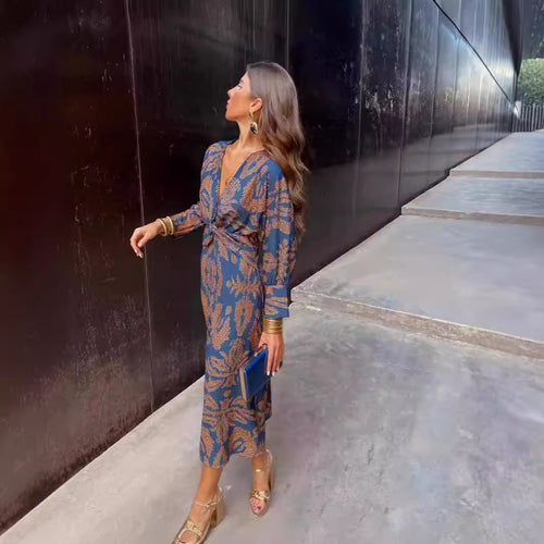 Damen Maxikleid mit elegantem Wickeldesign und floralem Muster Heidi-Mode