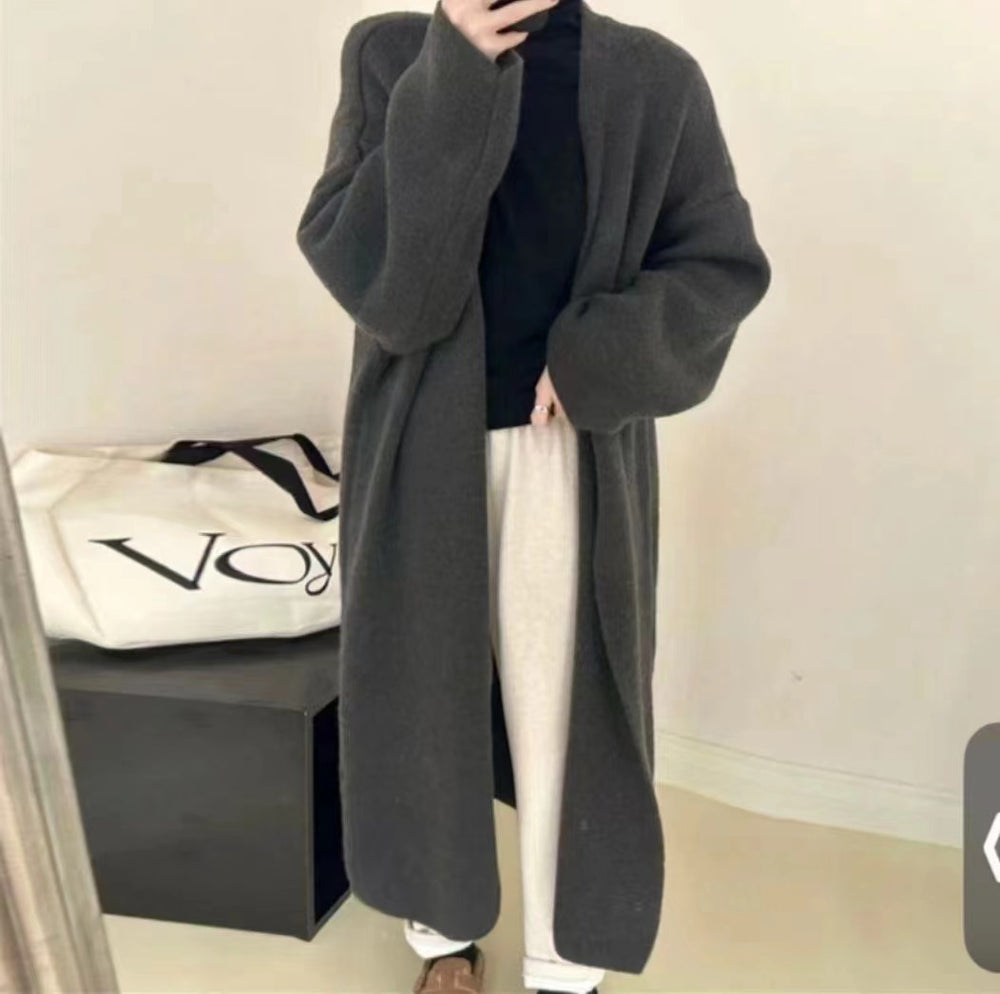 Damen Langer Wollmantel im minimalistischen Stil mit weitem Schnitt und eleganten Details Heidi-Mode