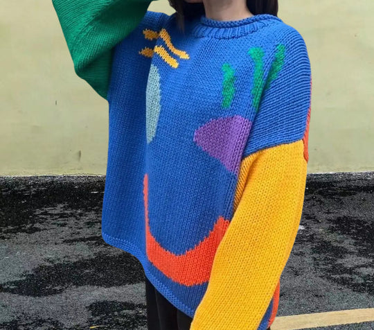 Damen gestrickter Pullover mit fröhlichem Smiley-Motiv und lässigem Schnitt Heidi-Mode