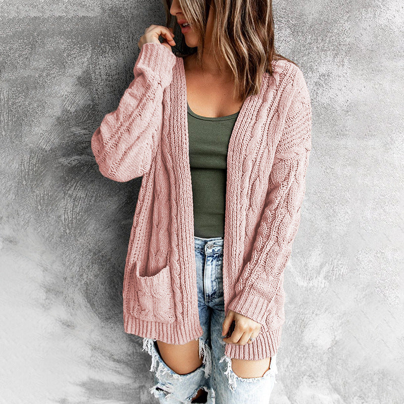 Damen Strickjacke mit modernem Zopfmuster und praktischen Taschen Heidi-Mode
