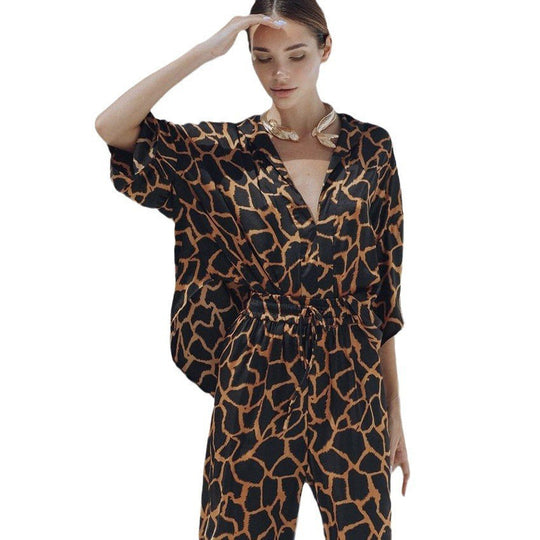 Damen Jumpsuit mit weit geschnittenen Beinen und elegantem Giraffenmuster Heidi-Mode