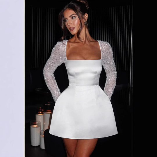 Damen Glamouröses Minikleid mit transparenten Paillettenärmeln und schwingendem Rock Heidi-Mode