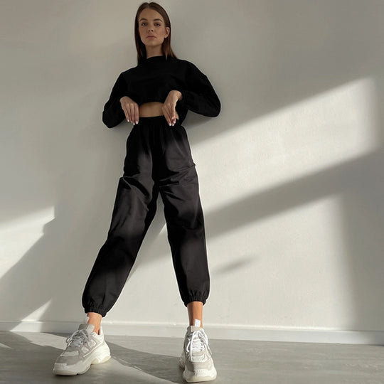 Damen lässiges Trainingsanzug-Set mit cropped Oberteil und weiten Hosen Heidi-Mode