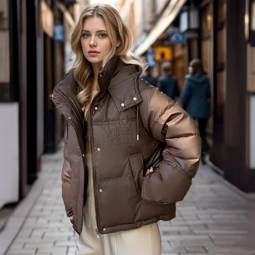 Damen gesteppte Winterjacke mit Kapuze und praktischen Taschen Heidi-Mode