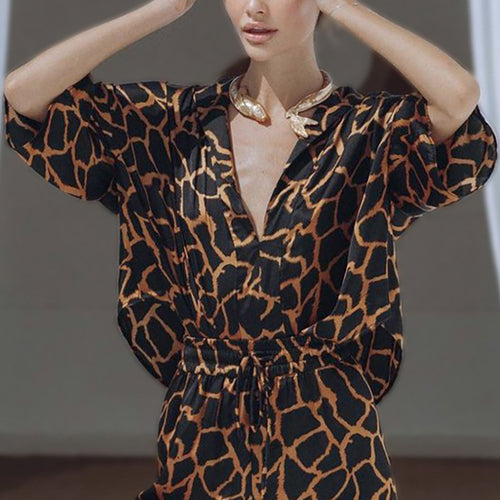 Damen Jumpsuit mit weit geschnittenen Beinen und elegantem Giraffenmuster Heidi-Mode