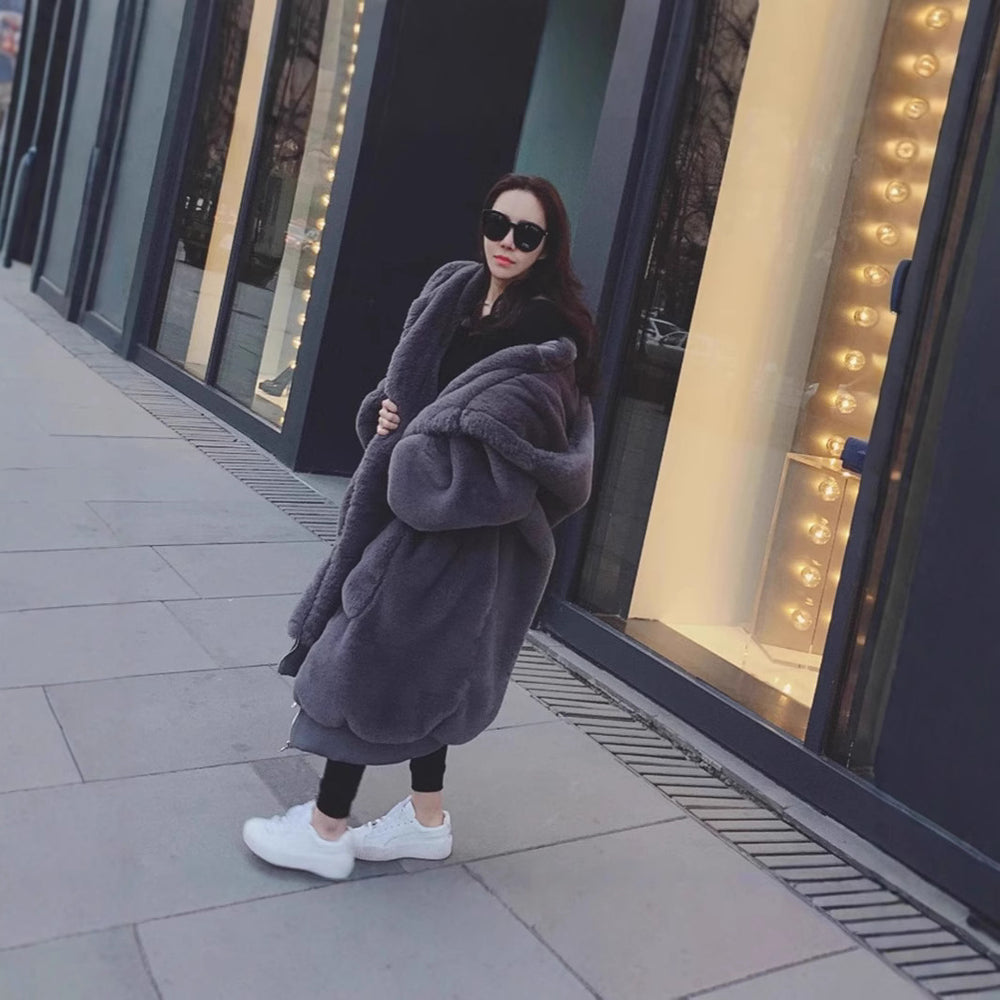 Damen Übergroßer Kunstfellmantel mit Kapuze und Taschen Heidi-Mode