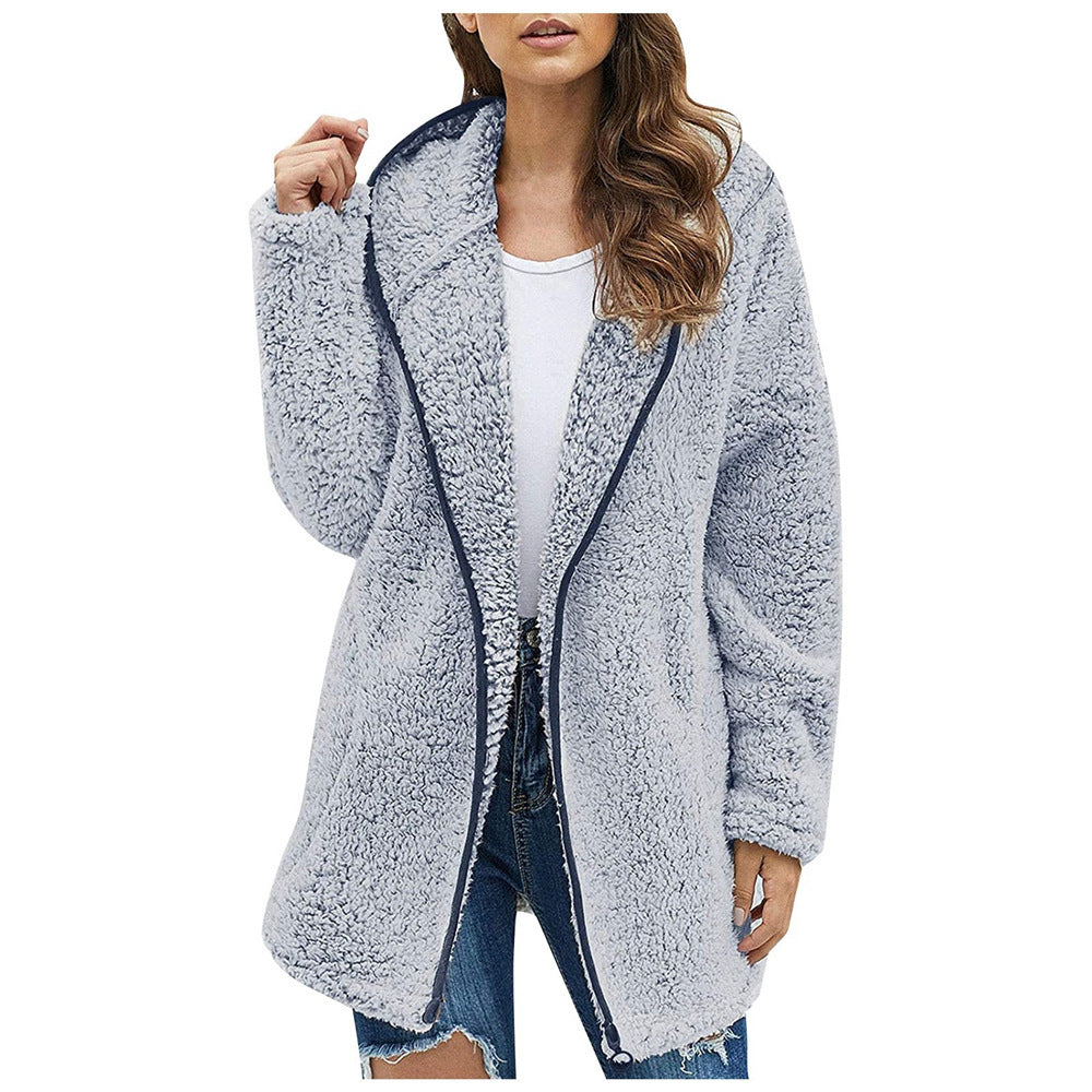 Damen Flauschige Kapuzenjacke im oversized Schnitt mit Eingrifftaschen und Reißverschluss Heidi-Mode