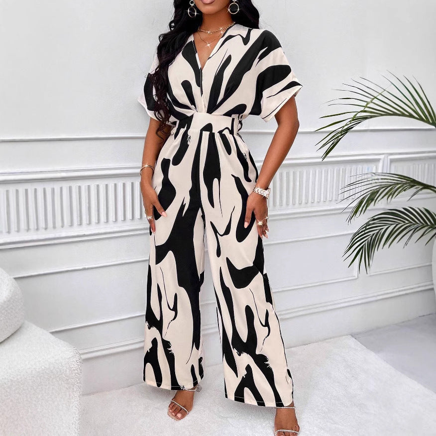 Damen Jumpsuit mit weiten Ärmeln und elegantem Gürtel Heidi-Mode