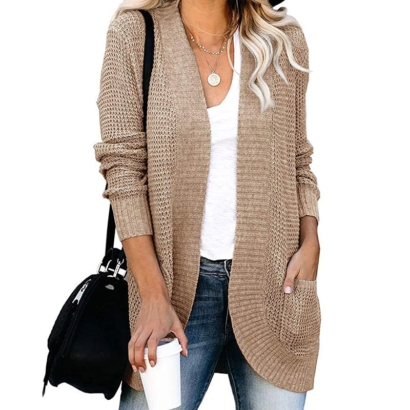 Damen Strickjacke mit tiefem V-Ausschnitt und praktischen Taschen Heidi-Mode