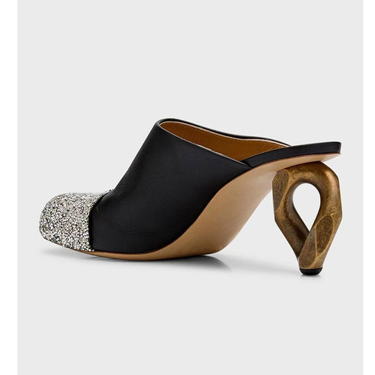 Femme Open-Toe Mules mit skulpturalem metallischem Absatz Heidi-Mode
