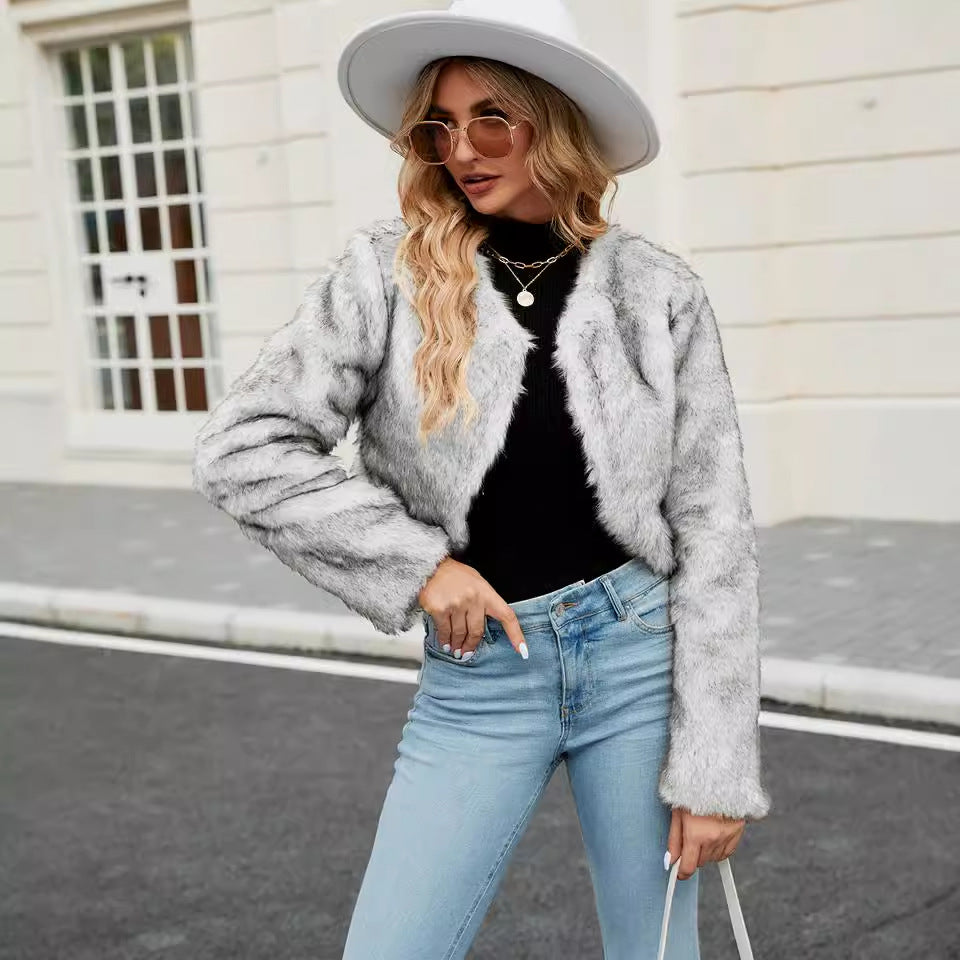 Damen Kurzjacke aus Kunstpelz mit weitem Schnitt und flauschigen Ärmeln Heidi-Mode