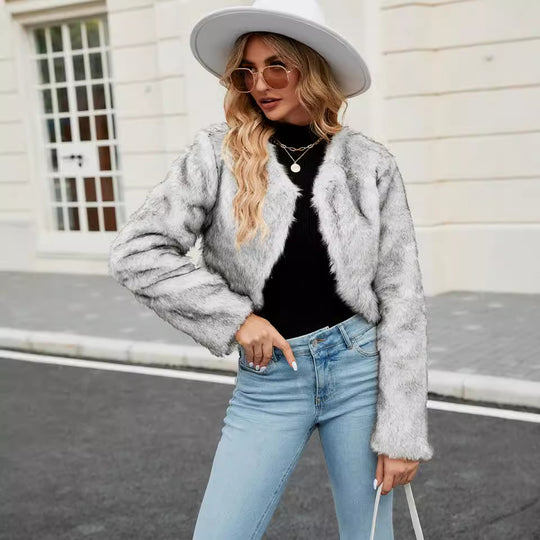 Damen Kurzjacke aus Kunstpelz mit weitem Schnitt und flauschigen Ärmeln Heidi-Mode