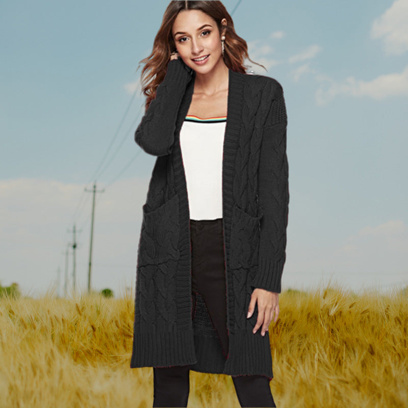 Damen Strickmantel mit großen Taschen und eleganten Zopfmustern Heidi-Mode