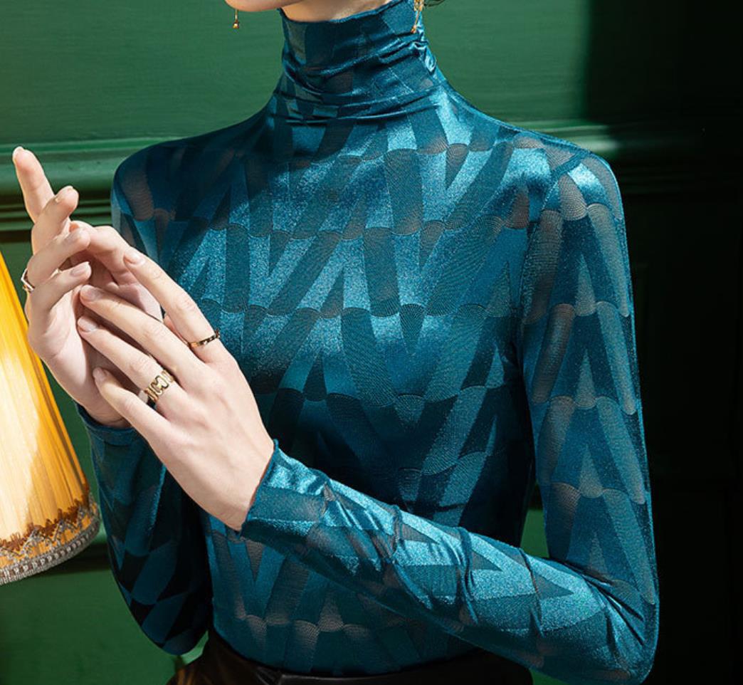 Damen Elegantes Rollkragenoberteil mit geometrischem Muster und transparenten Akzenten Heidi-Mode