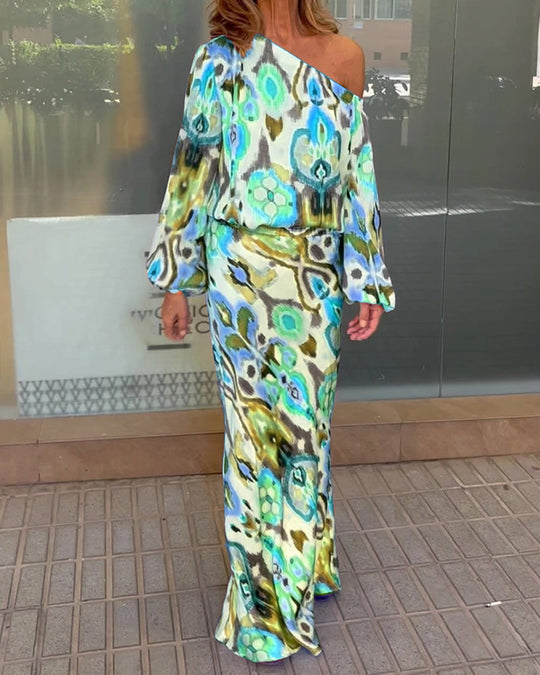 Damen Elegantes Maxikleid im grafischen Batikdesign mit Off-Shoulder-Ausschnitt und voluminösen Ärmeln Heidi-Mode