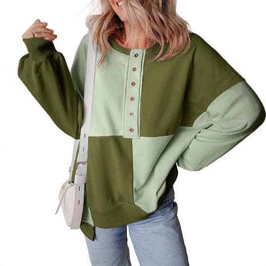 Damen lässiger Kapuzenpullover mit Knopfdetails und Farbblockdesign Heidi-Mode