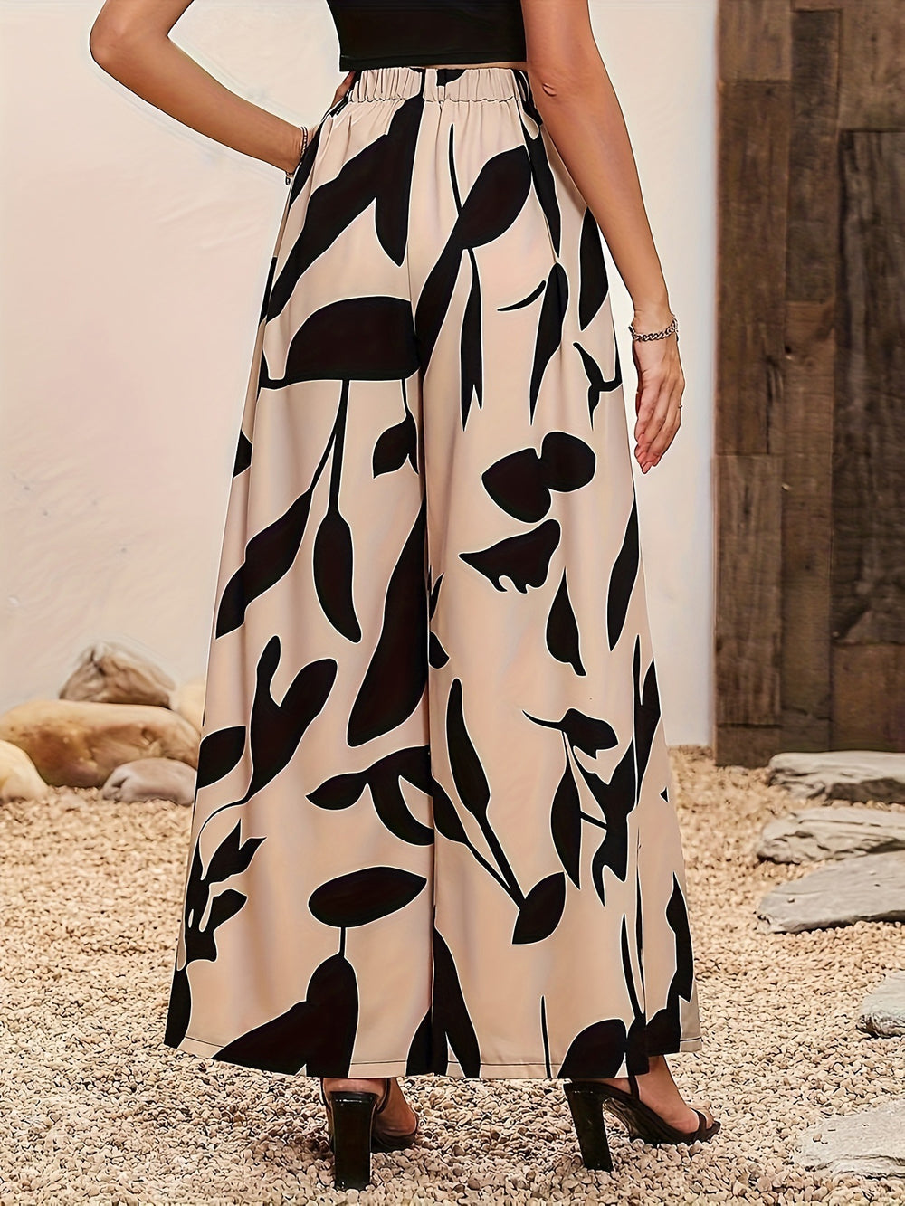 Damen Palazzo-Hose mit floralem Muster und weitem Schnitt Heidi-Mode