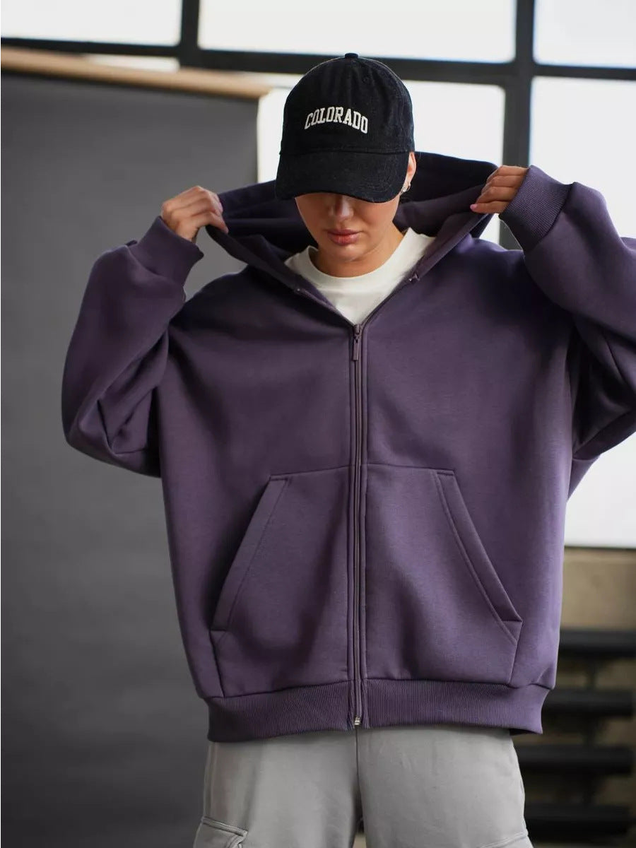 Damen oversized Kapuzenjacke mit durchgehendem Reißverschluss und großen Taschen Heidi-Mode