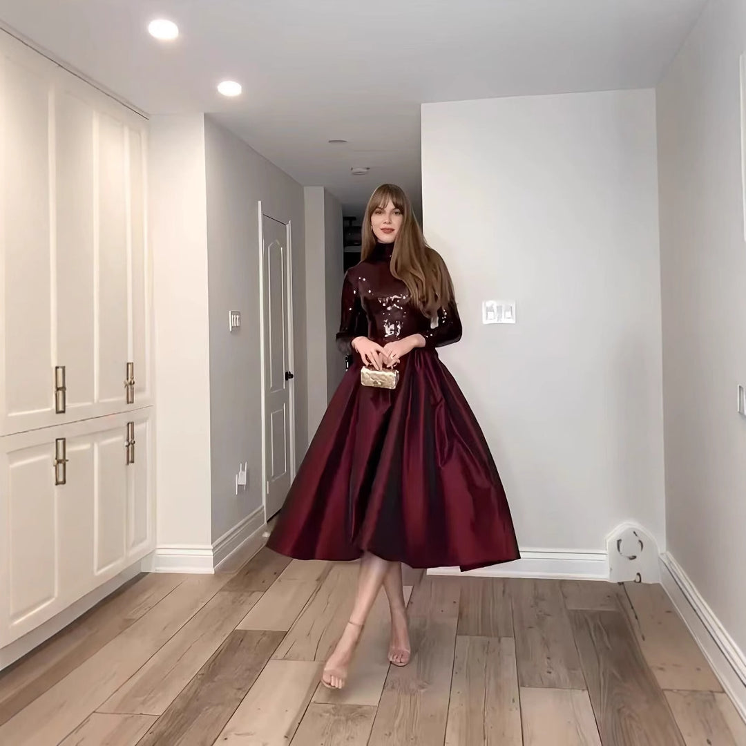 Damen Festliches Kleid mit glitzerndem Oberteil und schwingendem Rock Heidi-Mode