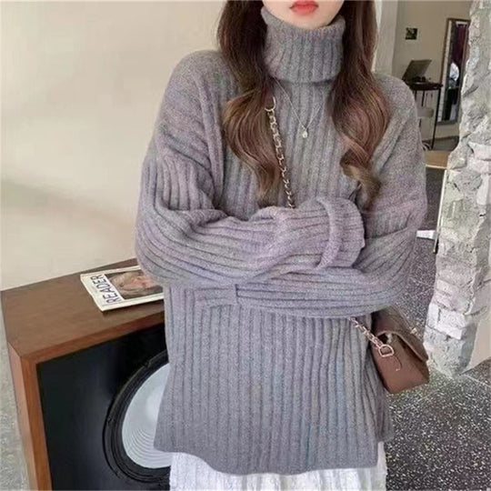 Damen Hochgeschlossenes Strickoberteil mit asymmetrischem Schnitt und feiner Rippstruktur Heidi-Mode