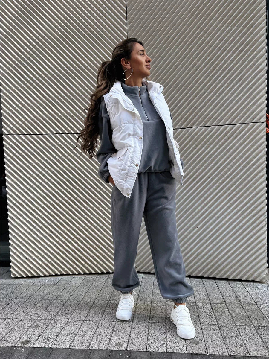 Damen sportliches Fleece-Jogginganzug mit halbem Reißverschluss und elastischen Bündchen Heidi-Mode