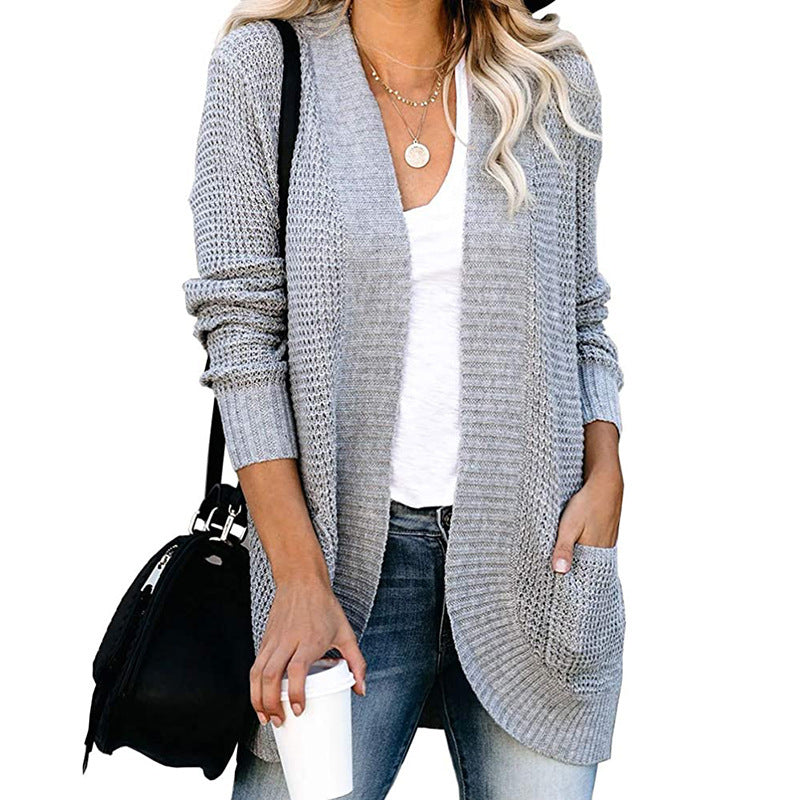 Damen Strickjacke mit tiefem V-Ausschnitt und praktischen Taschen Heidi-Mode