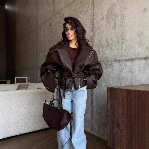 Damen elegante Kunstlederjacke mit Gürtel und übergroßen Ärmeln Heidi-Mode