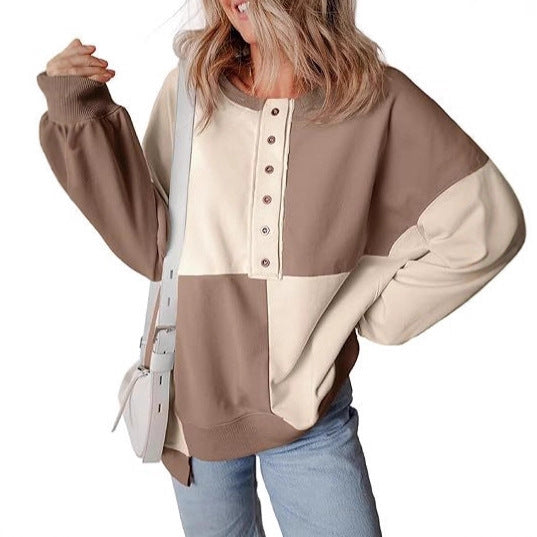 Damen lässiger Kapuzenpullover mit Knopfdetails und Farbblockdesign Heidi-Mode